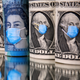 George Washington and Queen Elizabeth II are seen with printed medical masks on the one Dollar and Pound banknotes in this illustration.